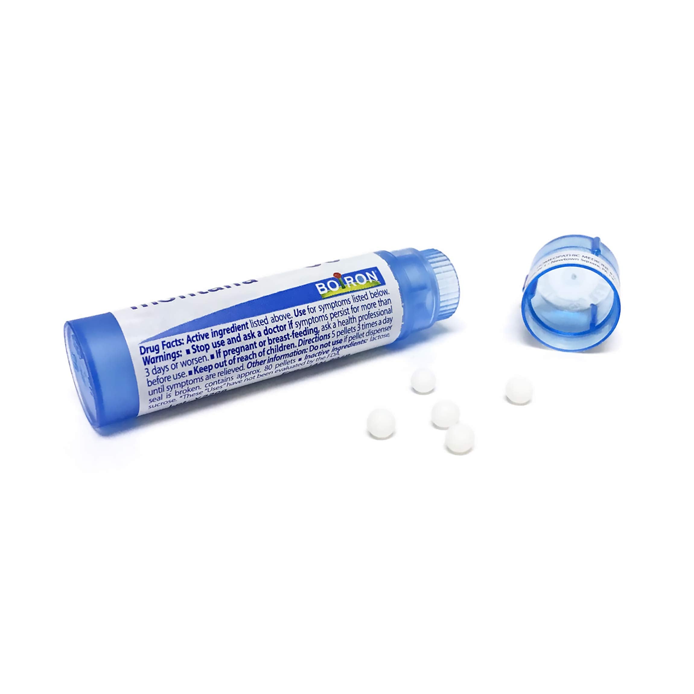 Boiron Hypericum 200CK pellets being poured from a multi-dose tube for easy dosing.