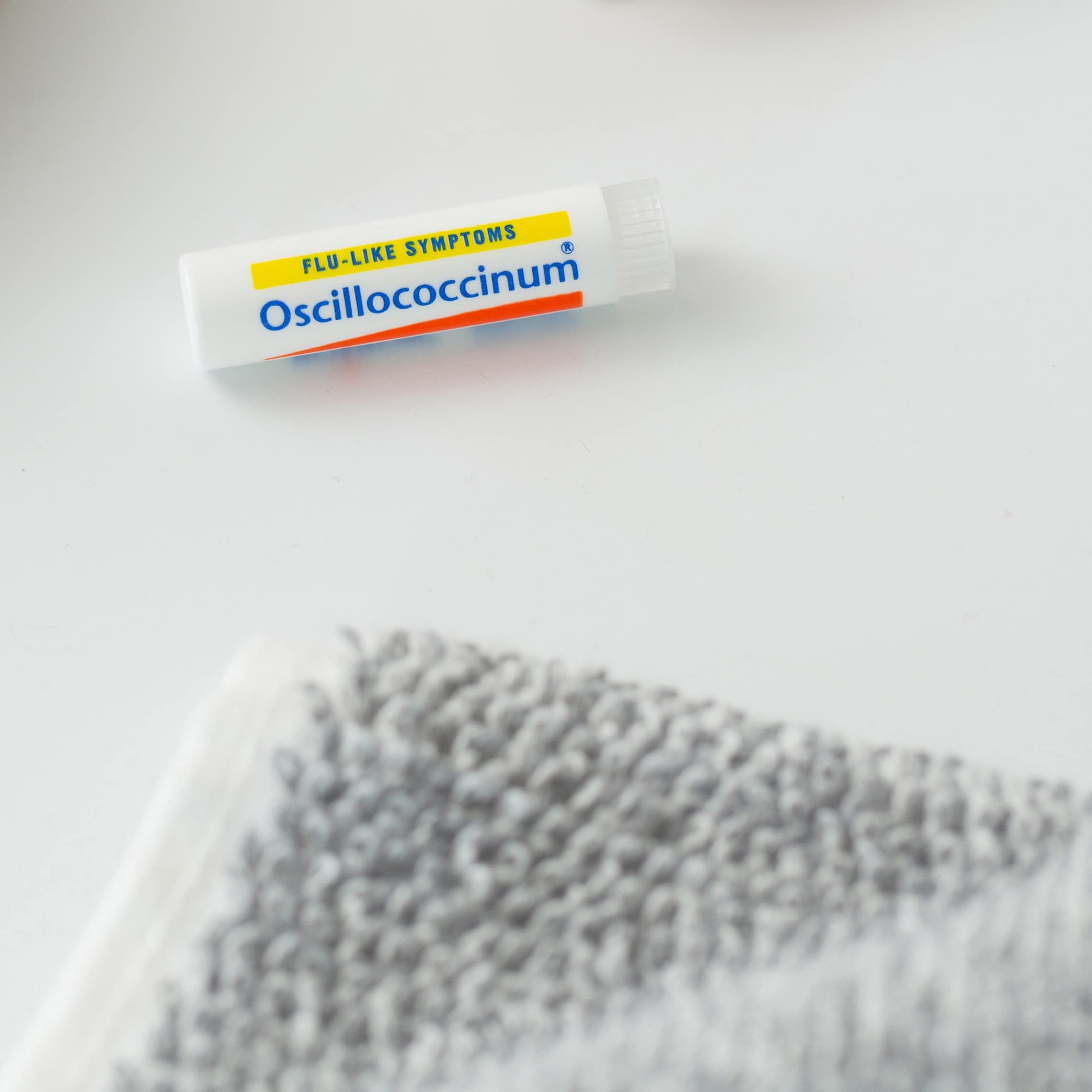 Boiron Oscillococcinum label notes non-drowsy formula with no known interactions.
