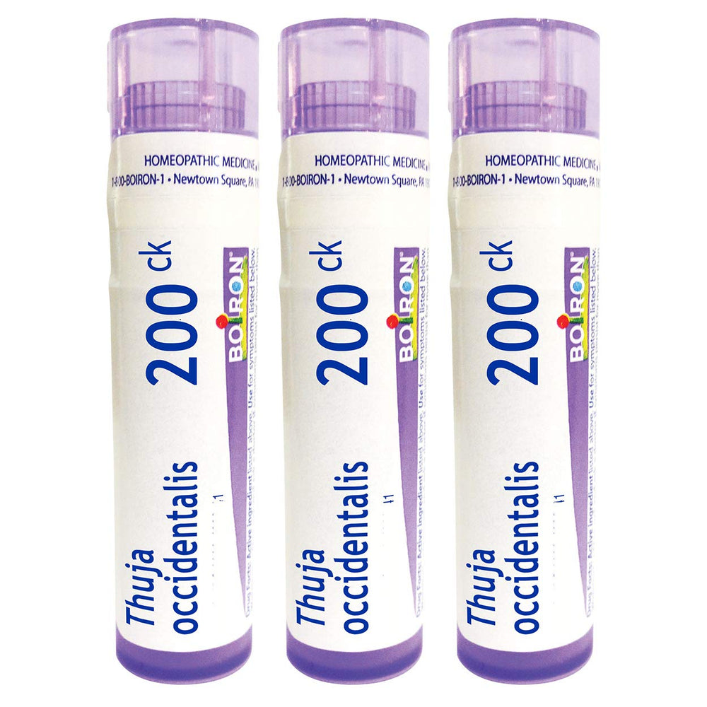 Boiron Thuja Occidentalis 200ck tubes on desk, ready for wart relief.