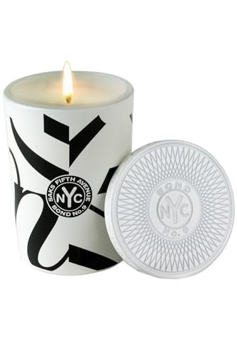 Bond No. 9 Saks Fifth Avenue for Her scented candle lit glow enhances ambience.