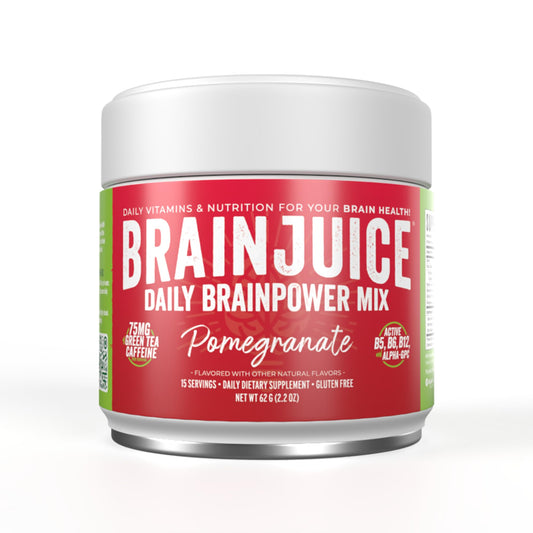 BrainJuice pomegranate powder dissolving in water for a refreshing focus boost.