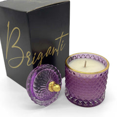 BRIGANTI Coconut Island candle in violet jar emits a coastal, relaxing fragrance.