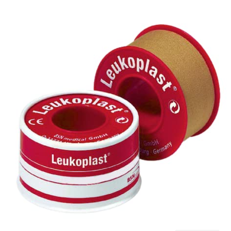 BSN Medical Leukoplast tape securing a dressing on skin for reliable fixation