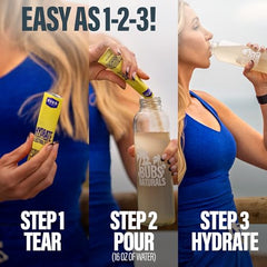 Glass of BUBS Hydrate or Die lemon electrolyte drink after training.