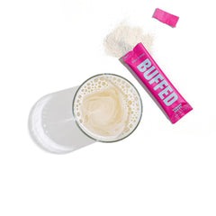 BUFFED Venom Berry powder dissolving in water for steady energy.