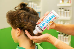 Family uses Buggin Out oil across different hair types.