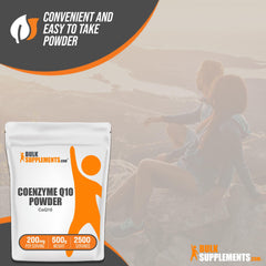 Scoop of BulkSupplements CoQ10 powder for precise dosing.
