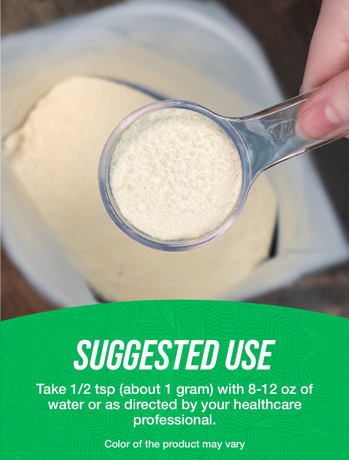 Powder being poured from a scoop into a glass for daily use.