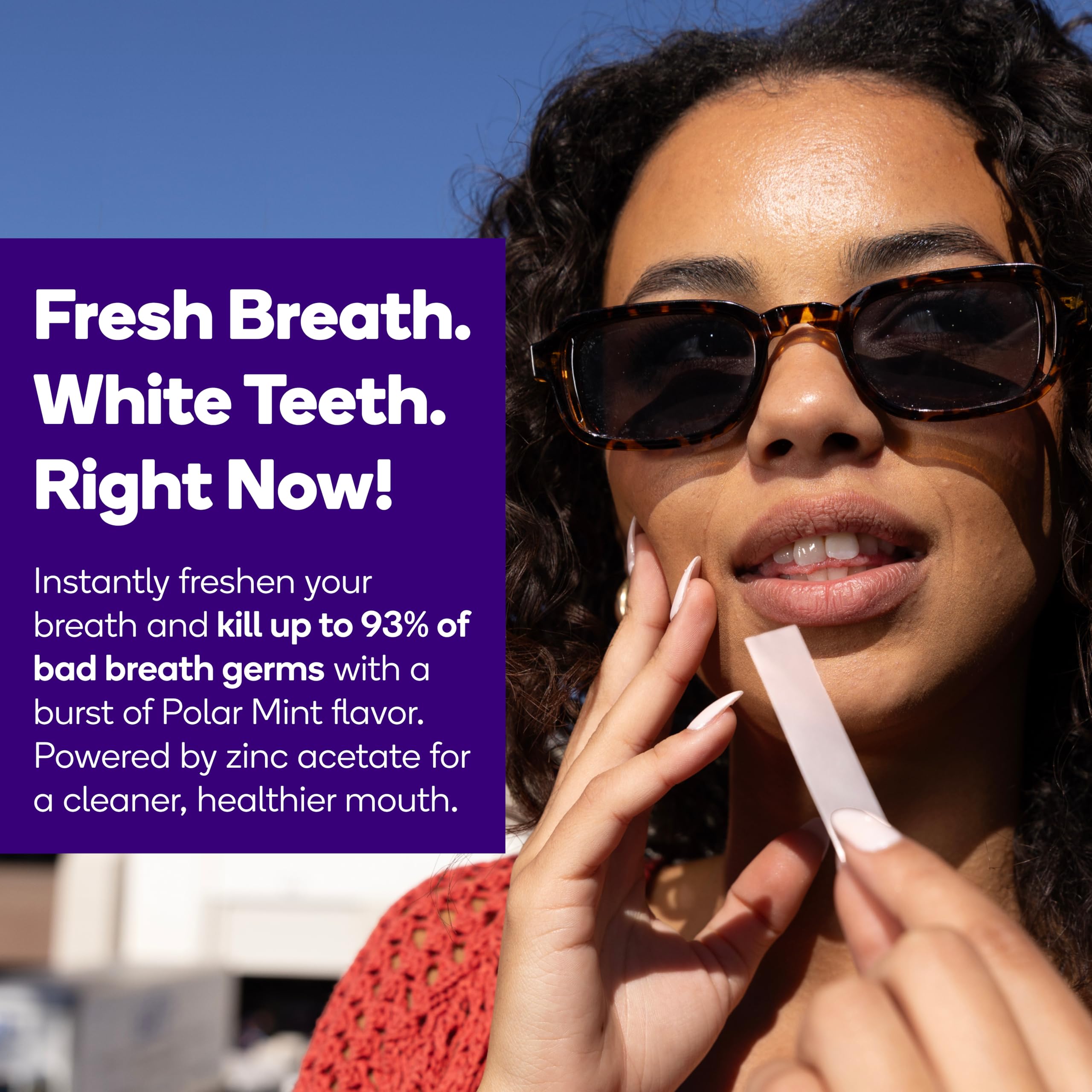 Burst Polar Mint strip dissolving on teeth for quick whitening and fresh breath.