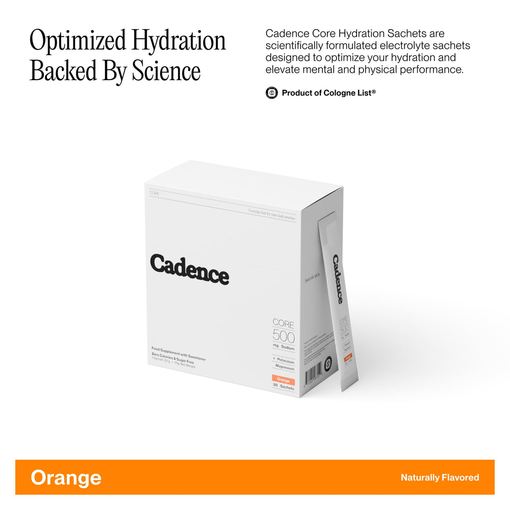 Cadence Core Orange sachets dissolve in water for quick hydration during workouts.