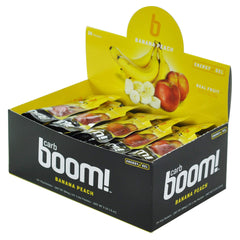 Carb Boom Banana Peach energy gel open pack for quick access mid-workout.