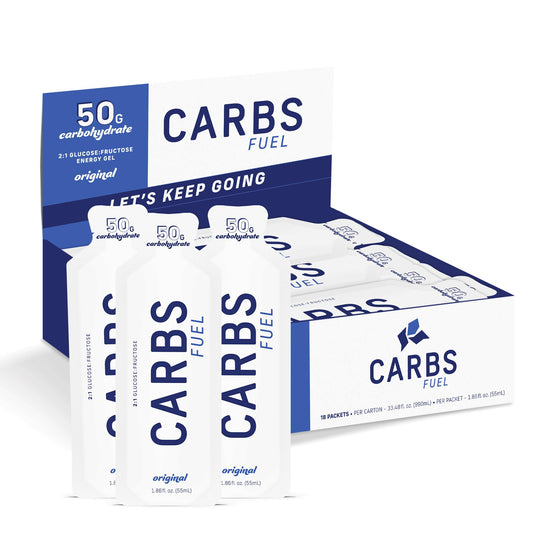 Carbs Fuel Original 50g gel pack on trail for endurance fueling