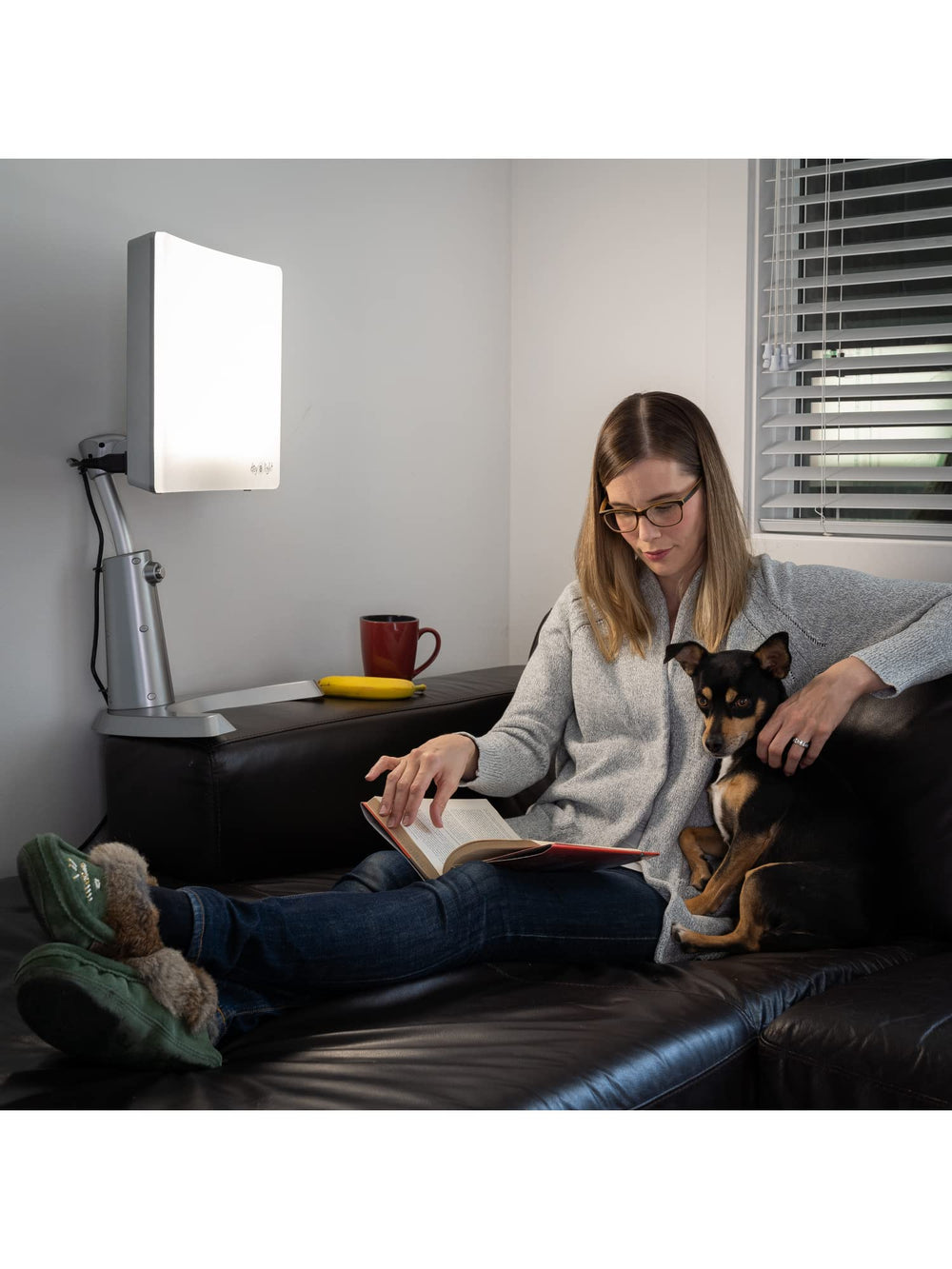 Carex Day-Light lamp with adjustable height for personalized therapy sessions.