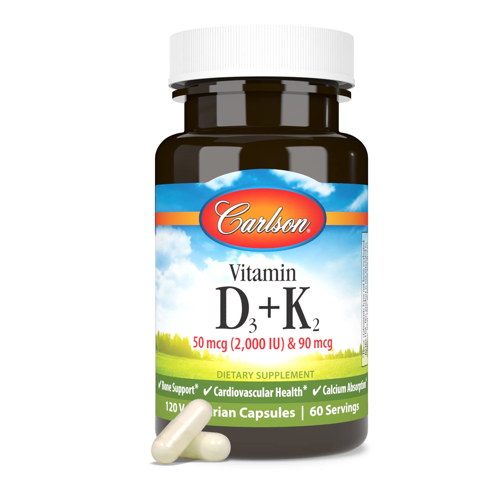 Carlson D3 + K2 capsules being poured for daily intake