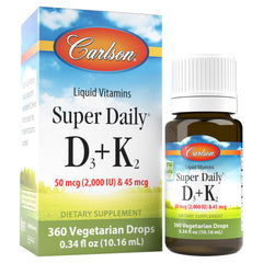 Carlson Super Daily D3 + K2 bottle on a kitchen counter supports bone and teeth health