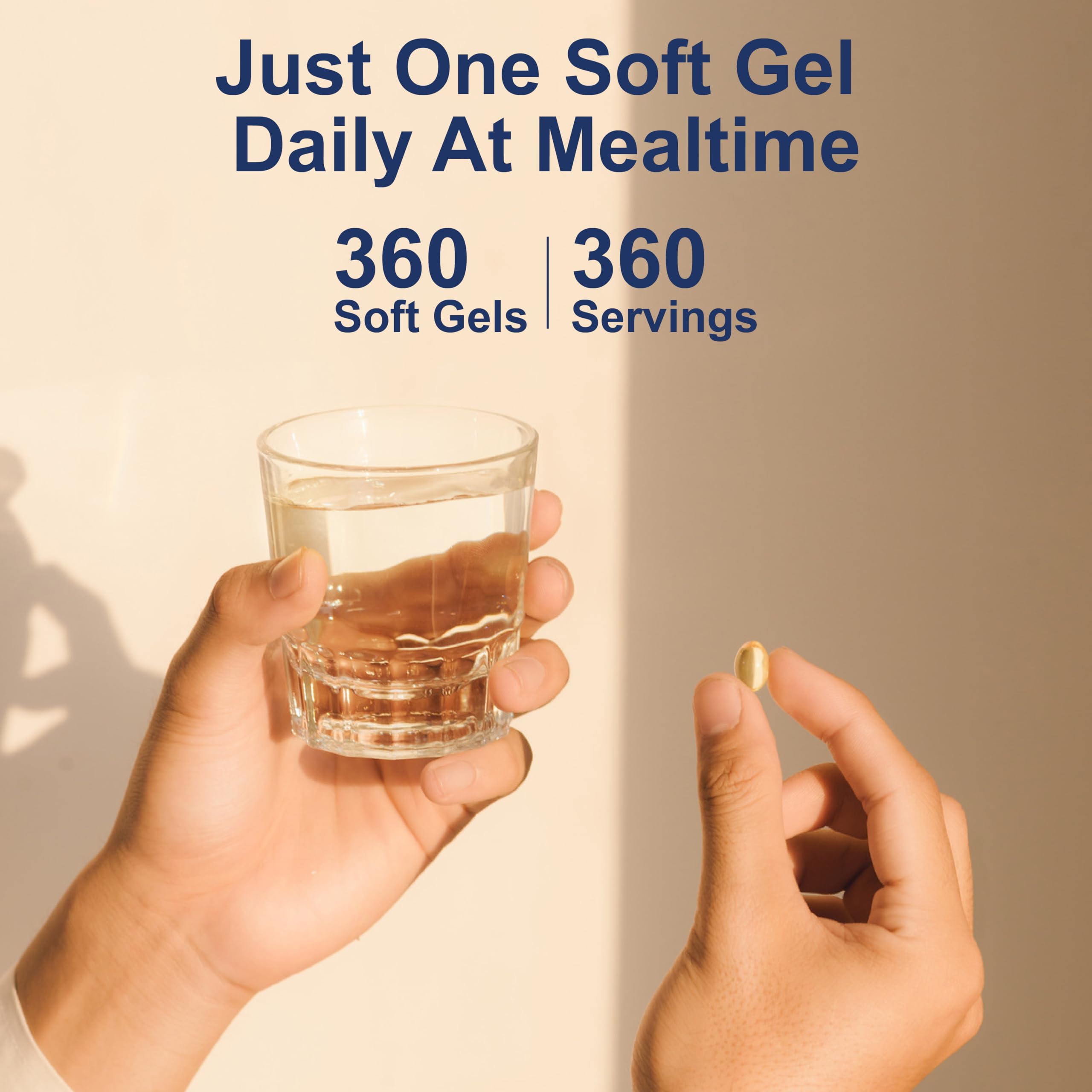 Carlson Vitamin D3 softgels arranged with a glass of water