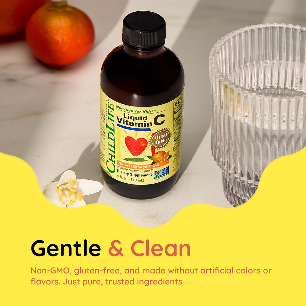 CHILDLIFE ESSENTIALS dropper in hand shows on-the-go use