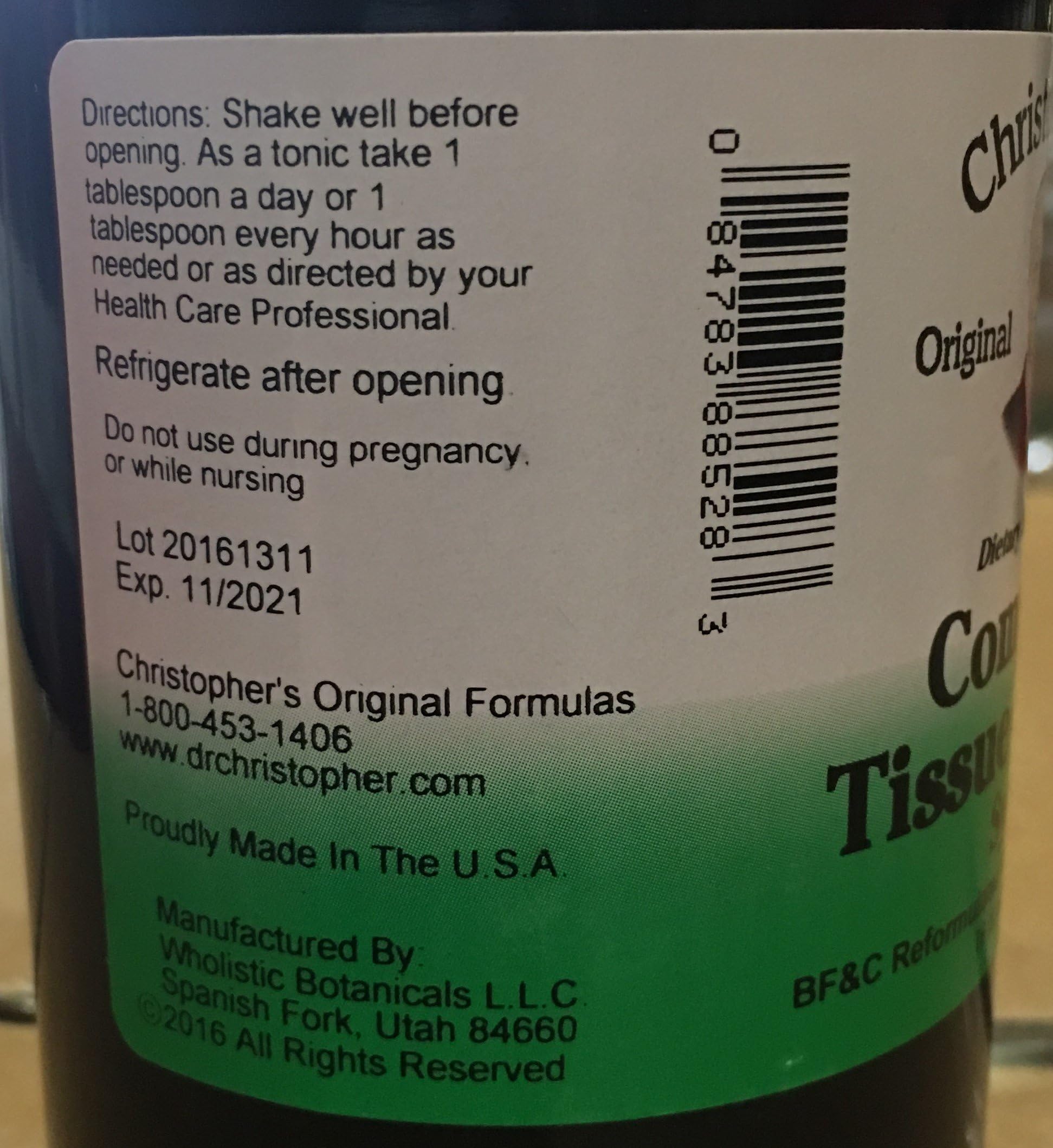 Close-up label of Christopher's Complete Tissue and Bone Syrup highlighting traditional herbal blend