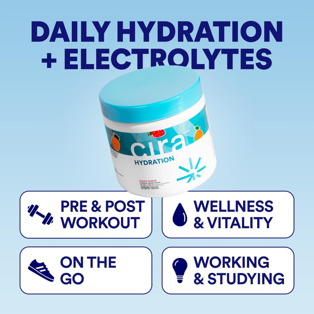 Cira Hydration Powder Fruit Punch scoop beside a glass of water ready to mix.