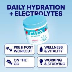 Cira Hydration Powder cup and glass ready to mix for post-workout refreshment