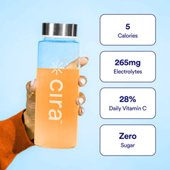 Measuring scoop beside Cira Hydration Peach Mango powder for easy on-the-go hydration.