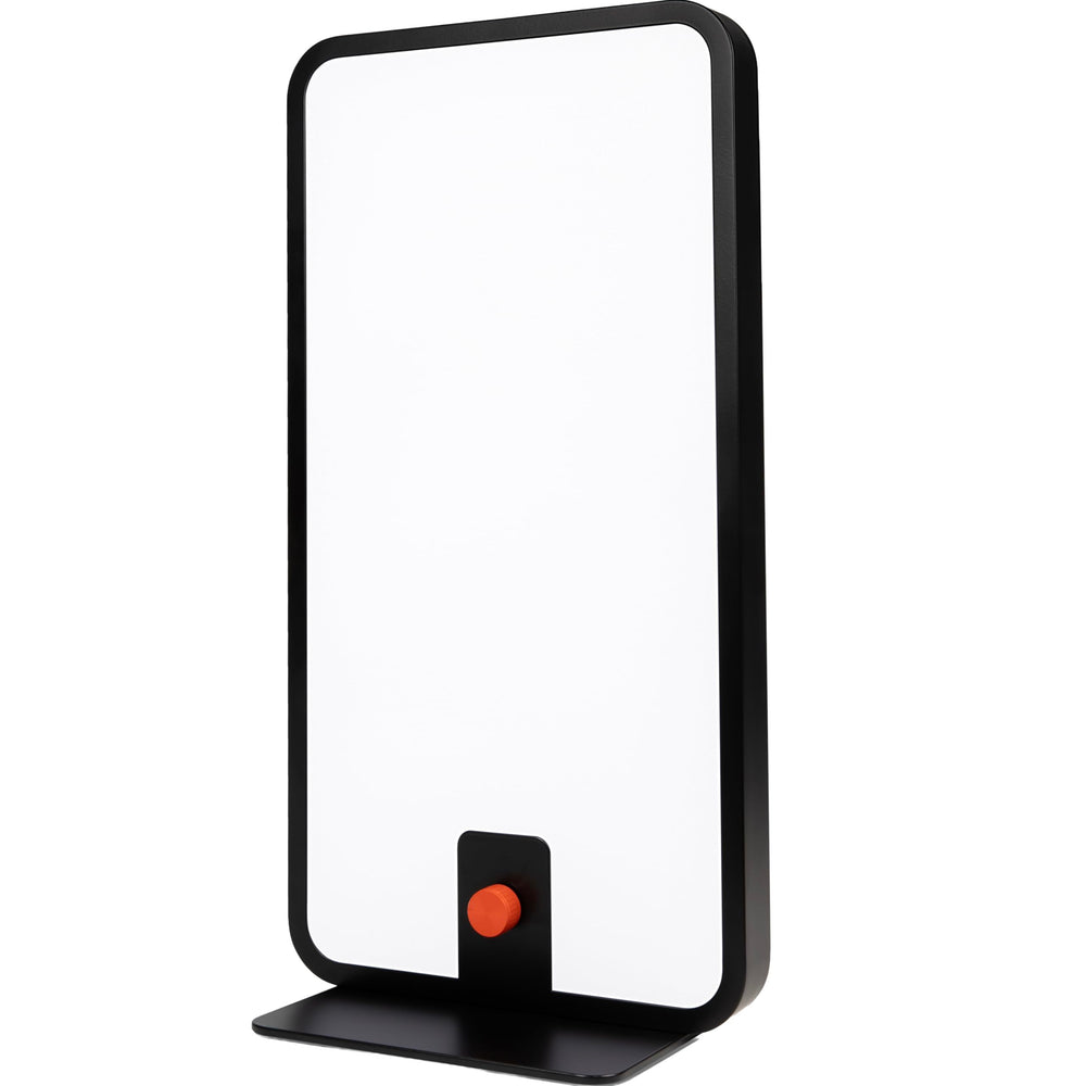 Circadian Optics Langham lamp sits on a desk for mood and focus support