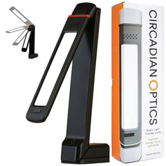 Circadian Optics Lumos 2.0 folding panel desk lamp shown for flexible placement
