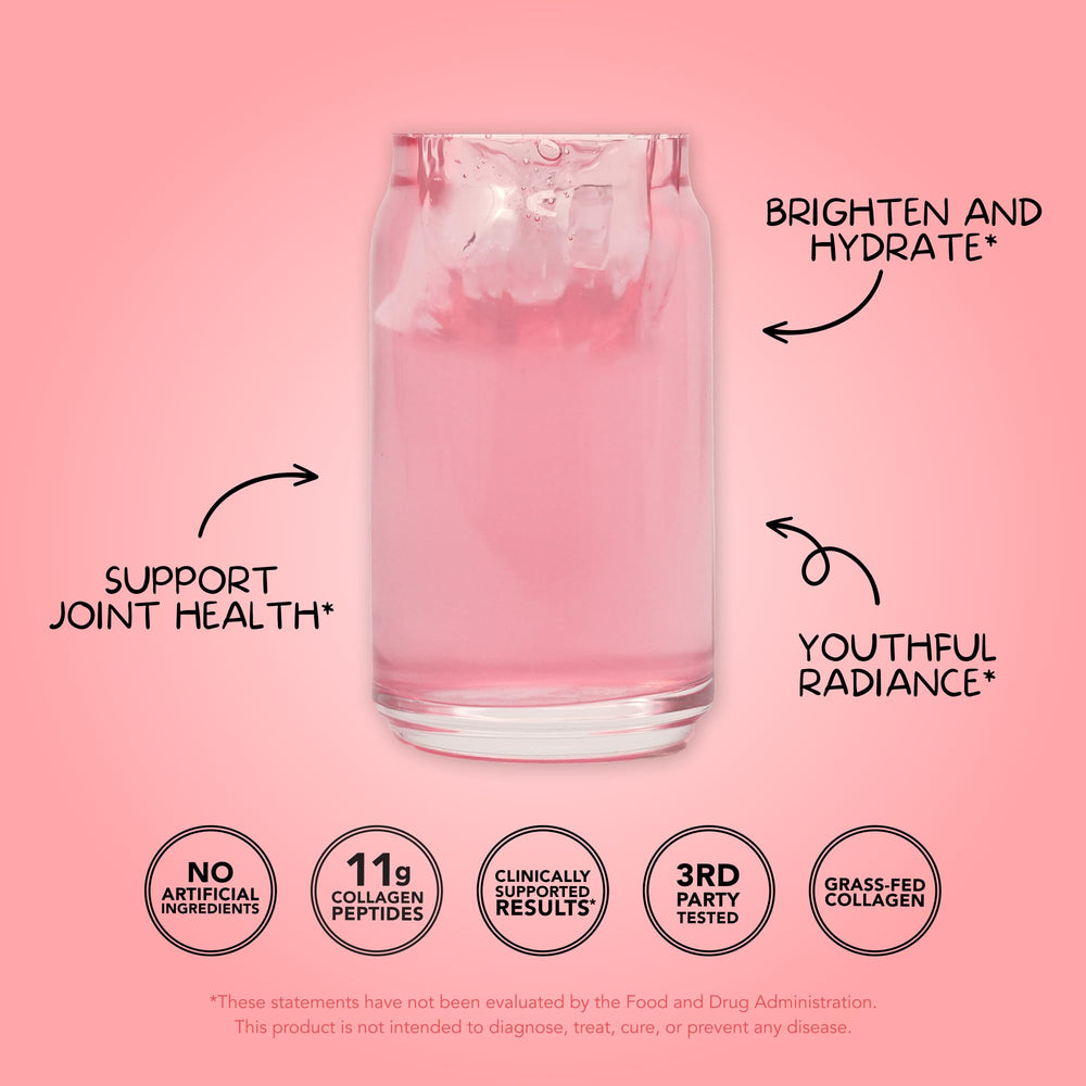Glass of strawberry colada collagen shake ready for morning rituals.