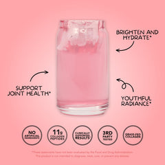 Glass of strawberry colada collagen shake ready for morning rituals.