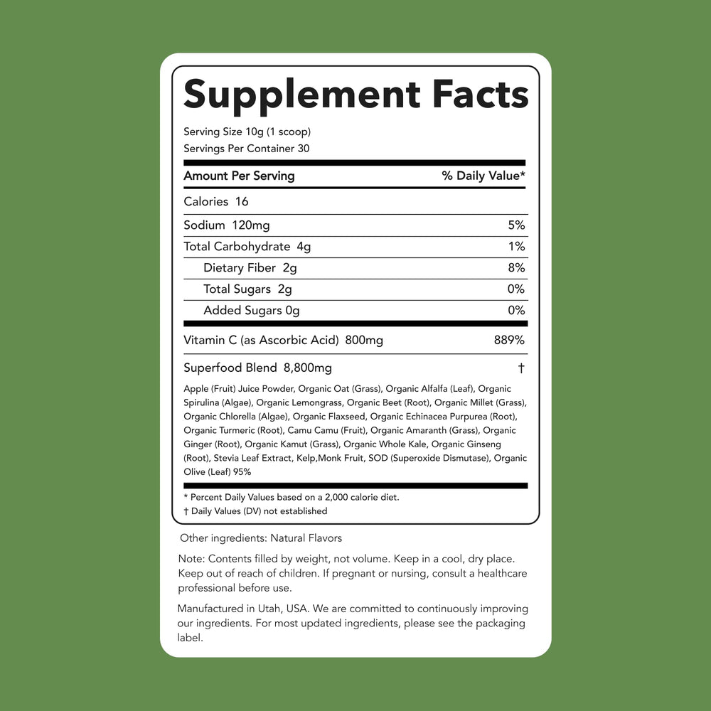 Clean Simple Eats Super Greens powder scoop in glass for quick hydration.