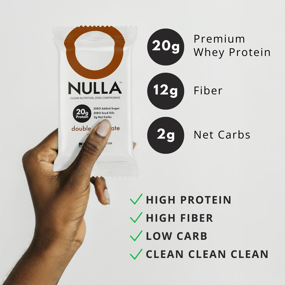 CleanForm Nulla Bar bite close-up emphasizes rich chocolate texture and aroma