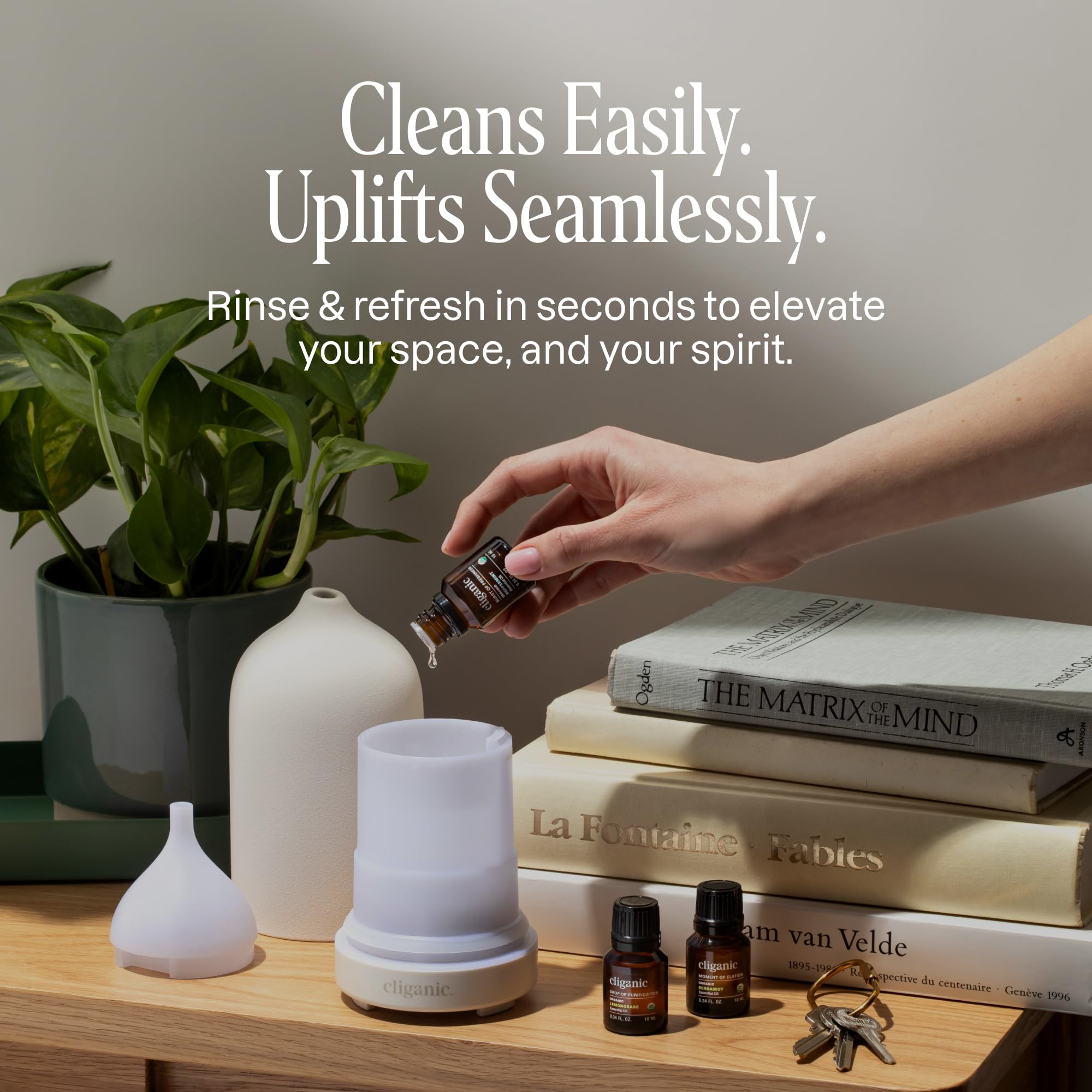 Cliganic diffuser on a home office desk, ideal for aromatherapy sessions.