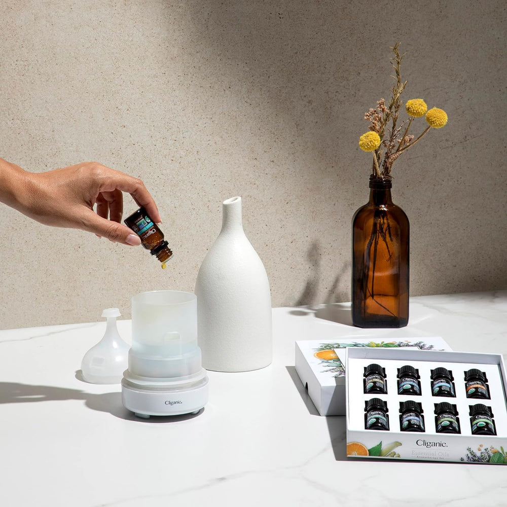 Cliganic rosemary essential oil bottle supports focus with a fresh herbal aroma