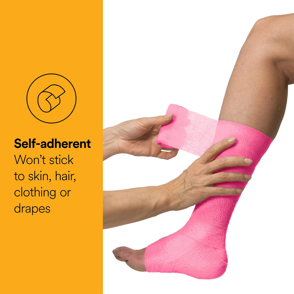 Coban pink self-adherent wrap close-up highlighting tearable design for quick use