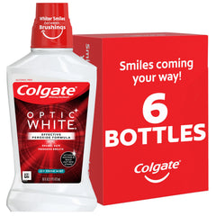 Colgate Optic White mouthwash bottle in fresh mint flavor for whitening.