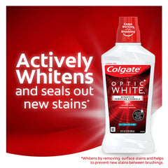 Colgate Optic White mouthwash being poured to show foaming action reaching corners.