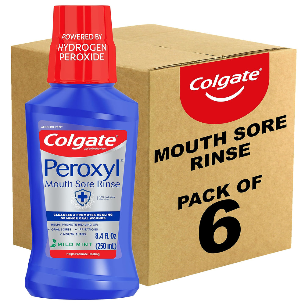 Colgate Peroxyl bottle pouring demonstrates an oxygenating rinse for minor oral irritations.