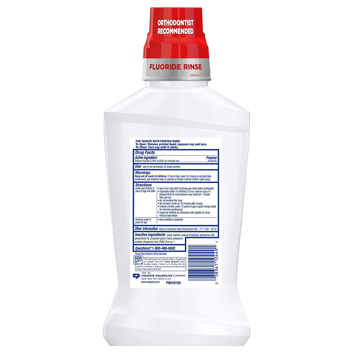 Cap of Colgate Phos-Flur mint rinse for precise daily dosing.