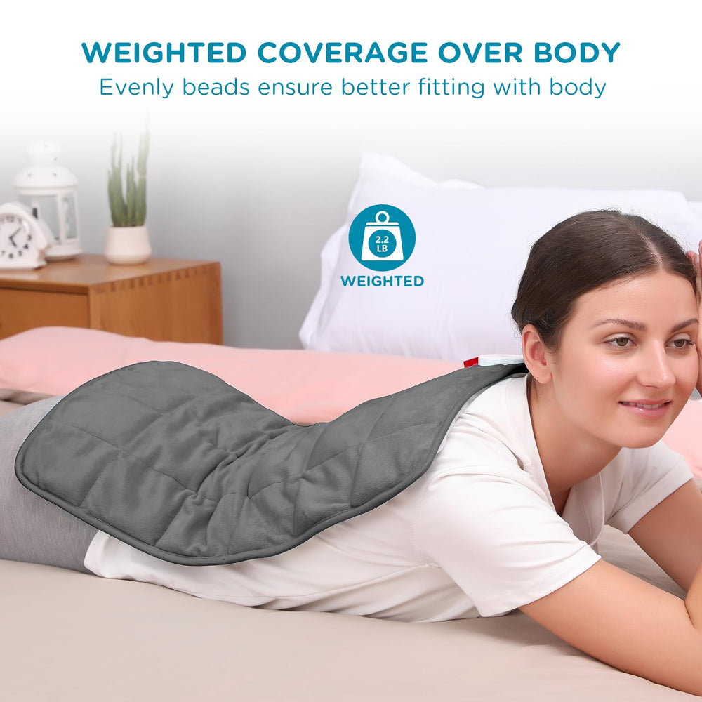Comfytemp weighted heating pad positioned on the back for steady heat