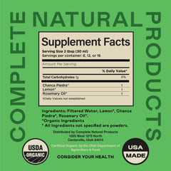 Liquid in glass of Complete Natural Products Chanca Piedra shows easy mixing with water.