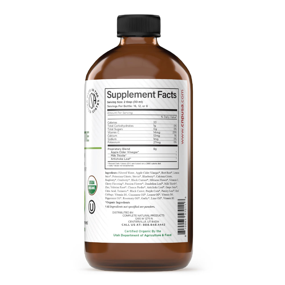 Close-up label on Complete Natural Liver Complete bottle highlighting organic ingredients.