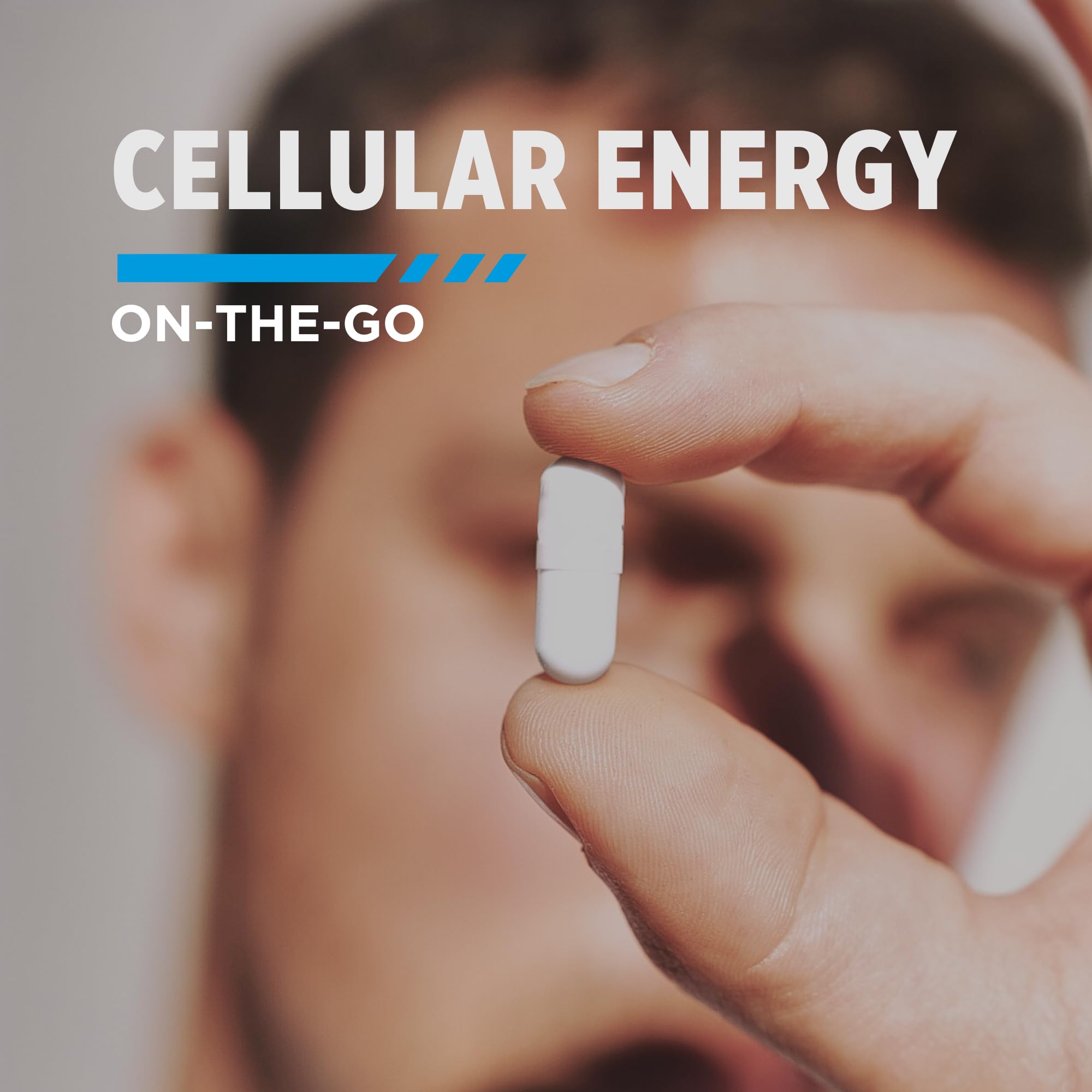 Hands holding CON-CRET capsules beside gym gear for athletic energy.