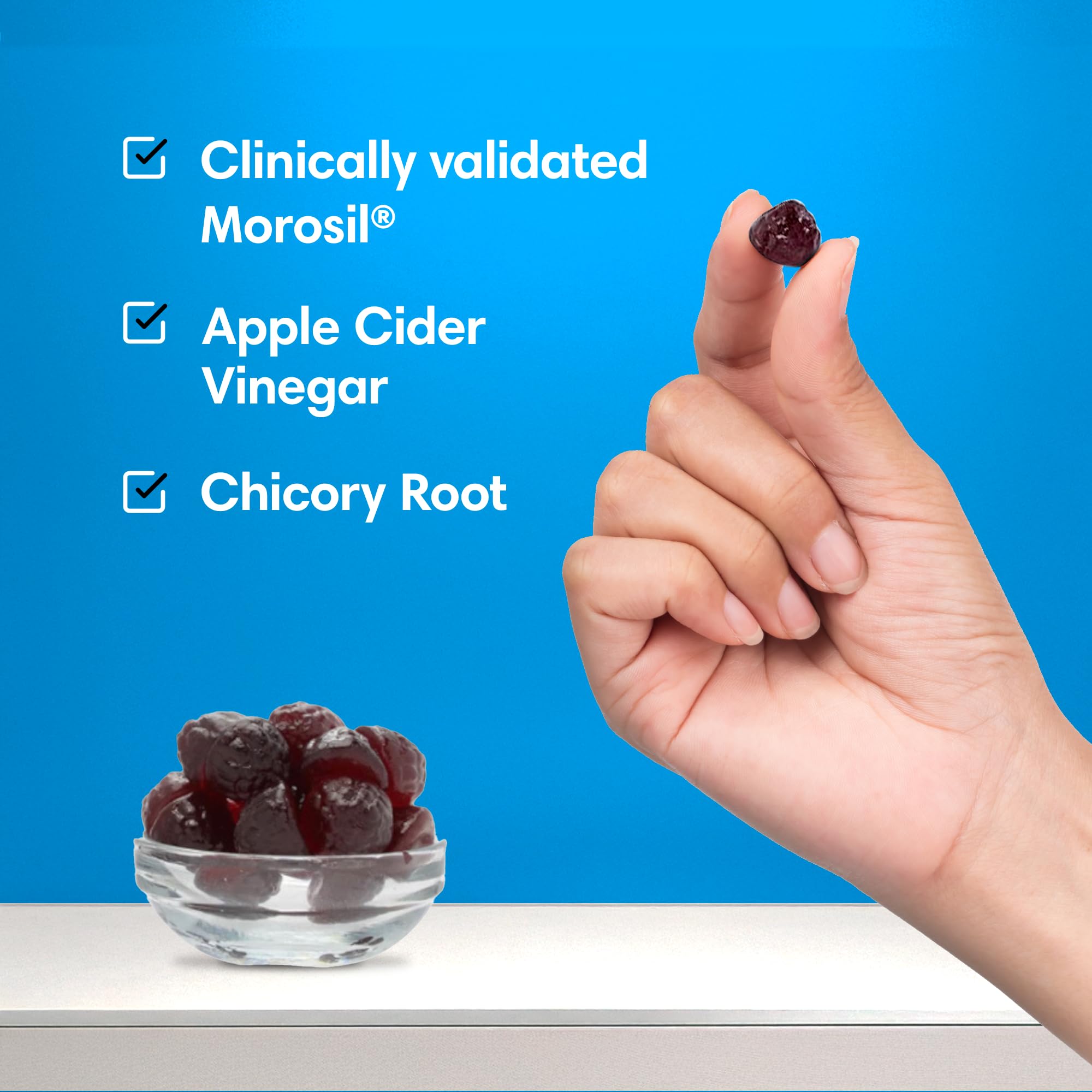 Gummies being taken with water to support a convenient daily routine.