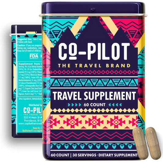 Co-Pilot The Travel Brand tin packaging shows a compact vegan travel vitamin kit for on-the-go trips.