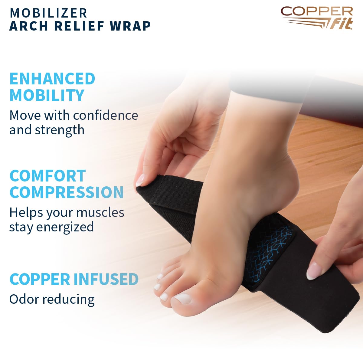 Copper Fit Mobilizer Arch Wrap adjustable strap in use for a customized fit