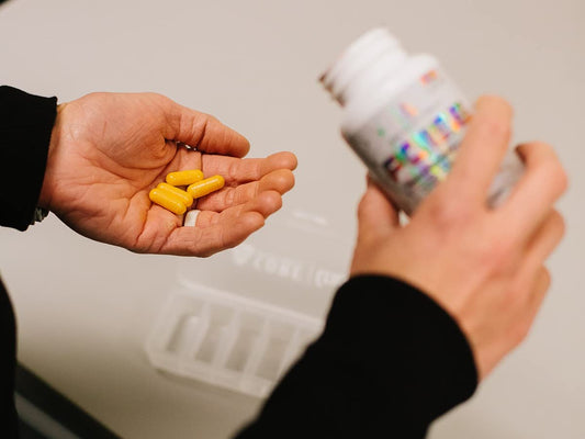 Core Nutritionals Poise capsules closeup highlighting magnesium and iodine ingredients.