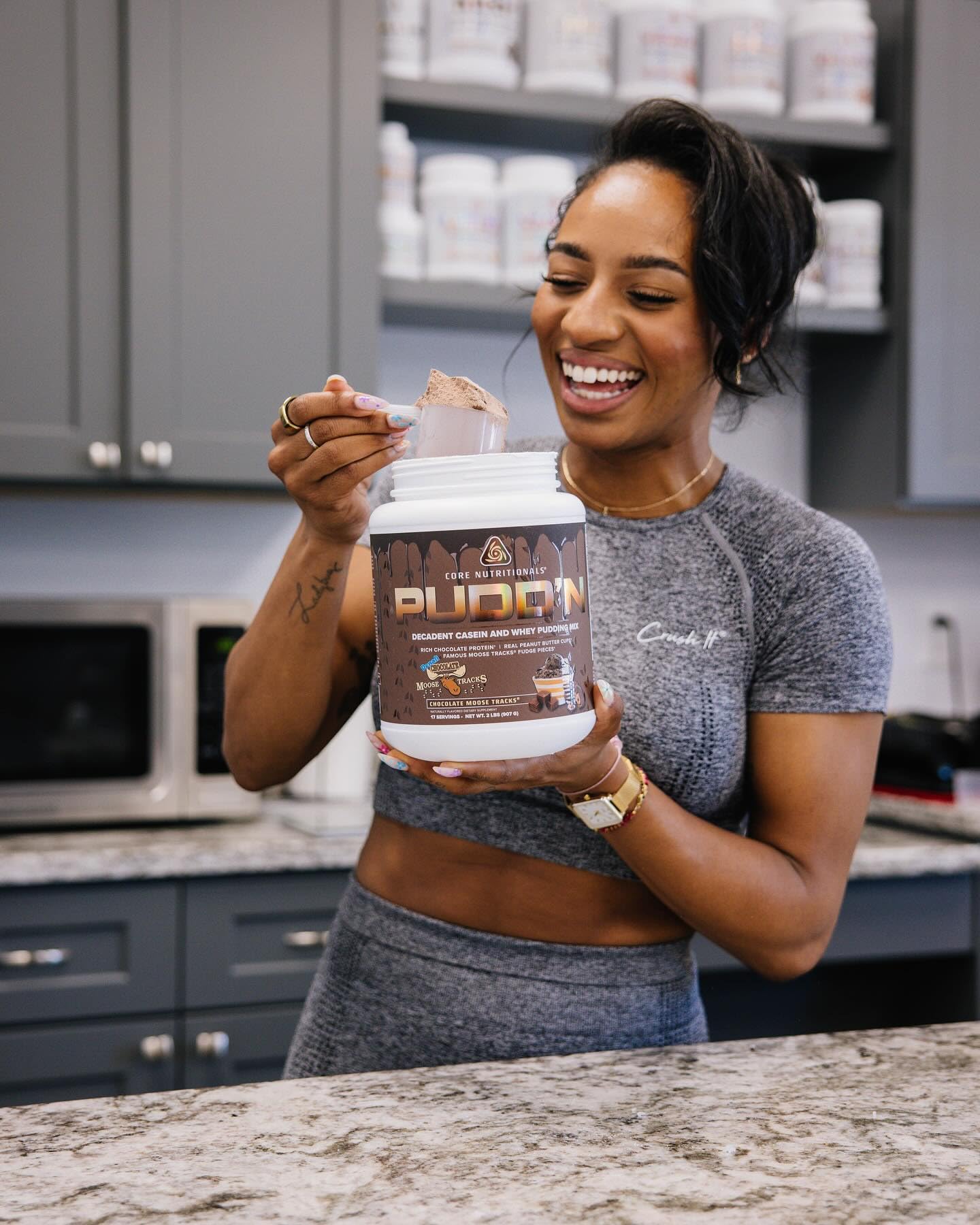 Core Nutritionals Pudd'n stirring action demonstrates smooth, satisfying texture at snack time.
