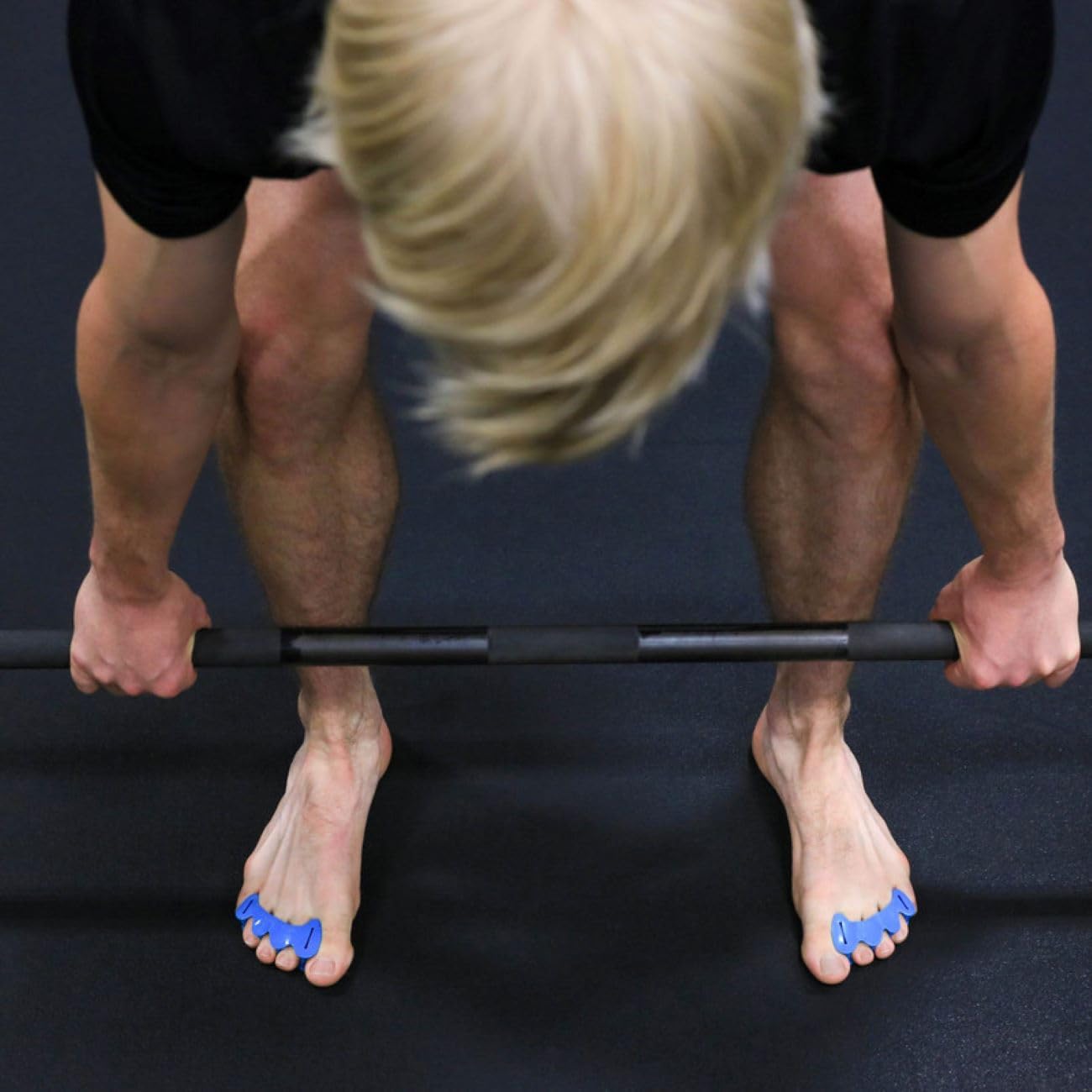 Correct Toes at-home use image illustrating easy daily relaxation with inserts.