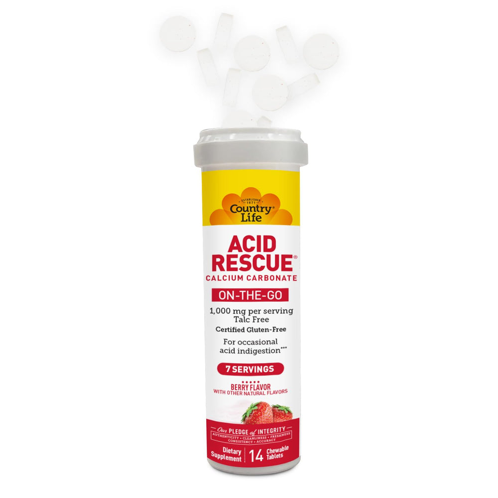 Country Life Acid Rescue chewable tablet being chewed for heartburn relief