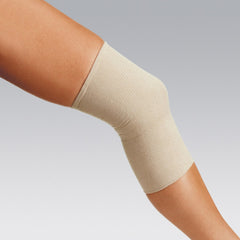 Coverflex Grip tubular bandage demonstrates easy slip-on application for quick use.
